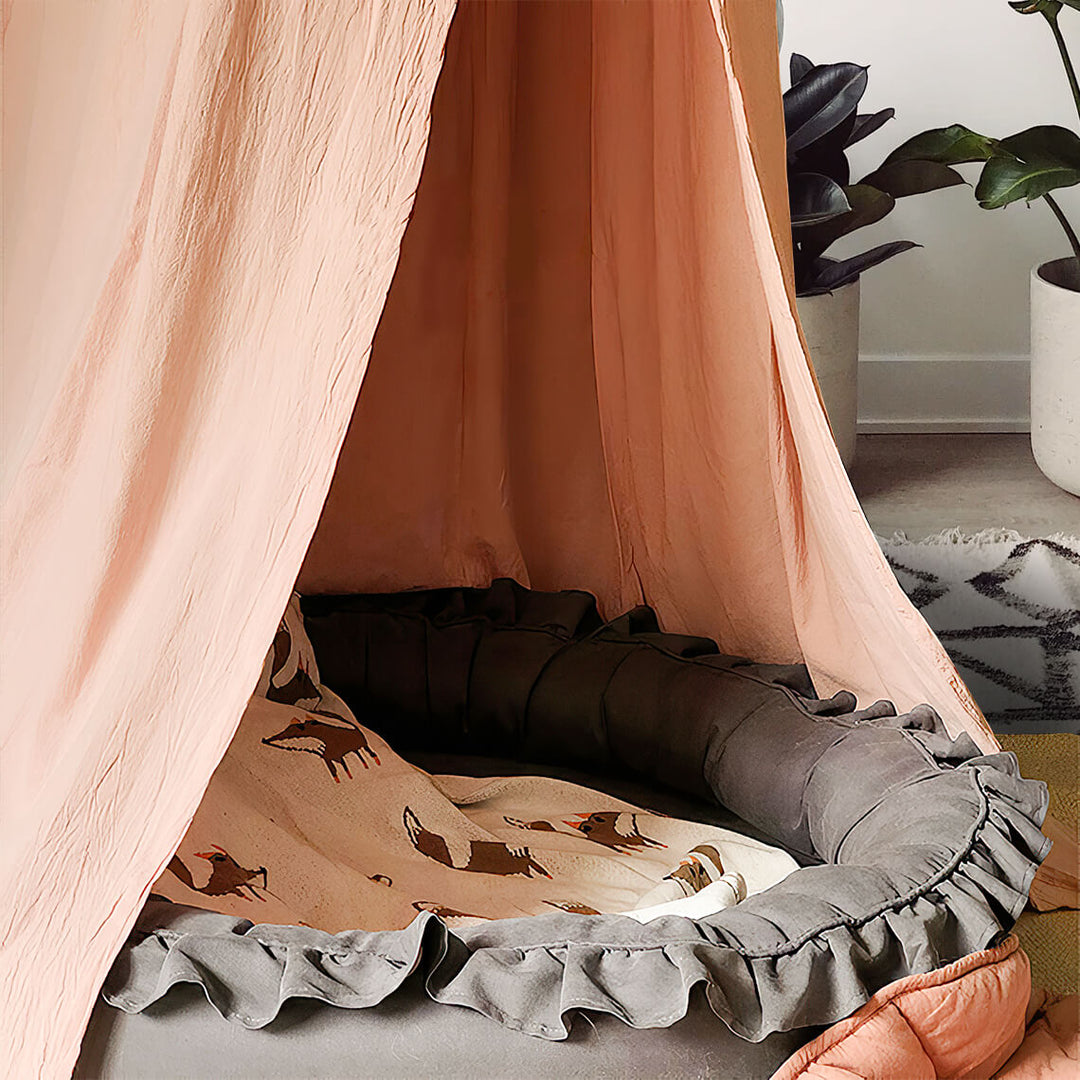 Cozy pet teepee tent in a living room setting, elegant dog bed or cat house home decor