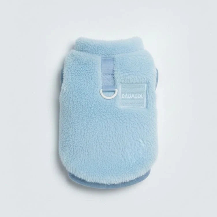 Dog walking outdoors in a blue Cozy Pet Winter Vest, winter dog clothes, pet cozy