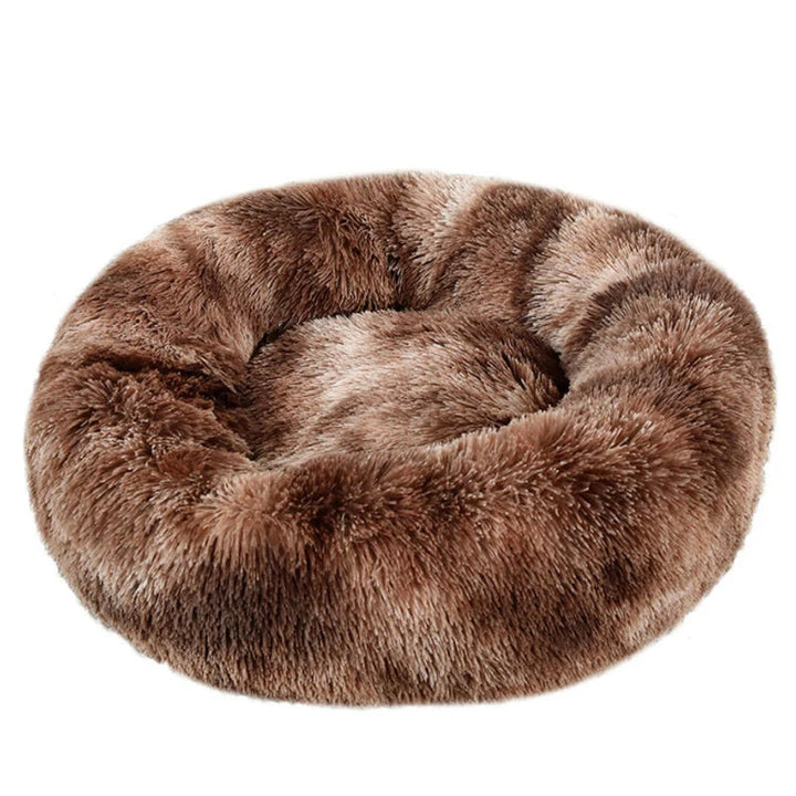 Luxurious pet bed, a cozy plush round donut design, perfect for deep sleep for dogs and cats.