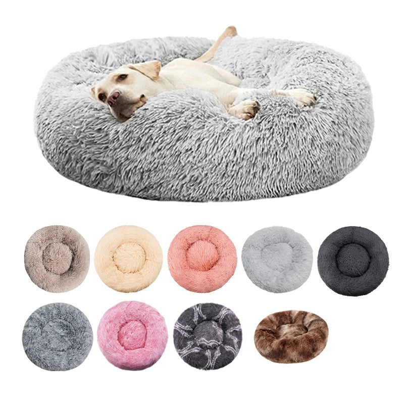 Plush round pet bed in a tan color, donut design provides warmth and support for pets.