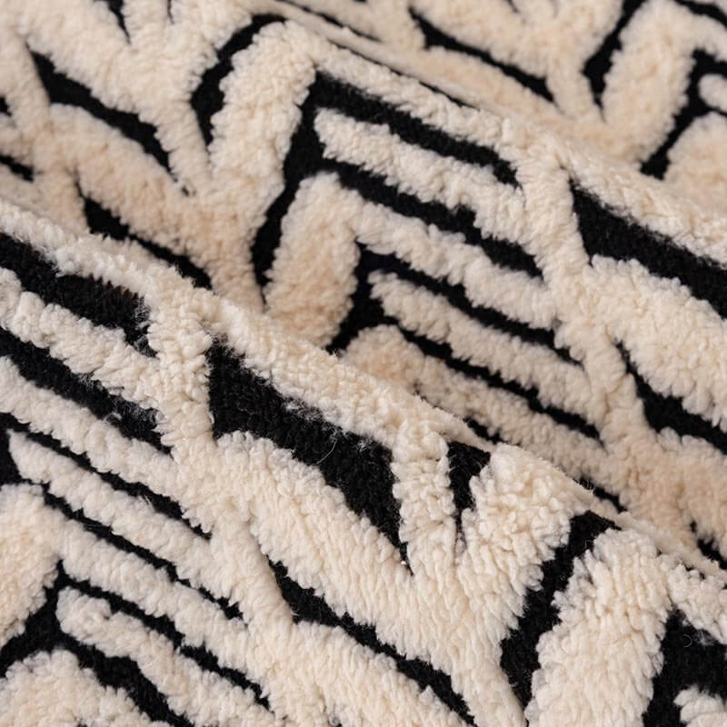 Beige plush sofa cover with unique wheat-ear anti-slip texture, ideal for protecting furniture from pets