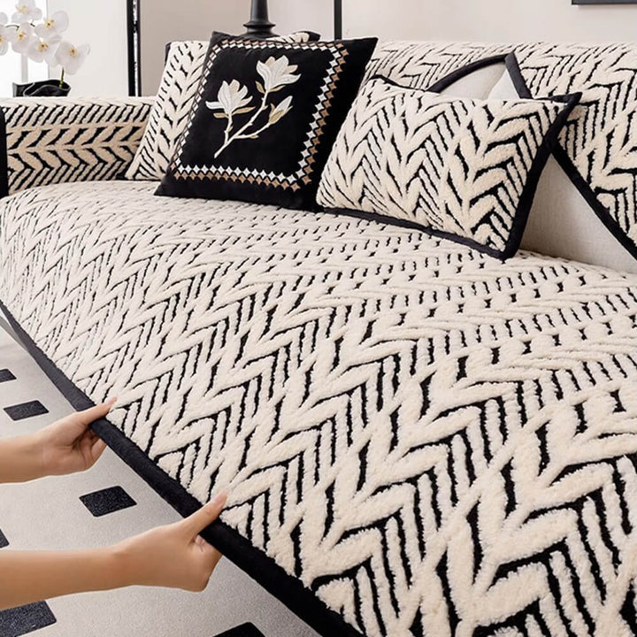 Close-up of the plush fabric and intricate wheat-ear anti-slip design on a durable couch cover