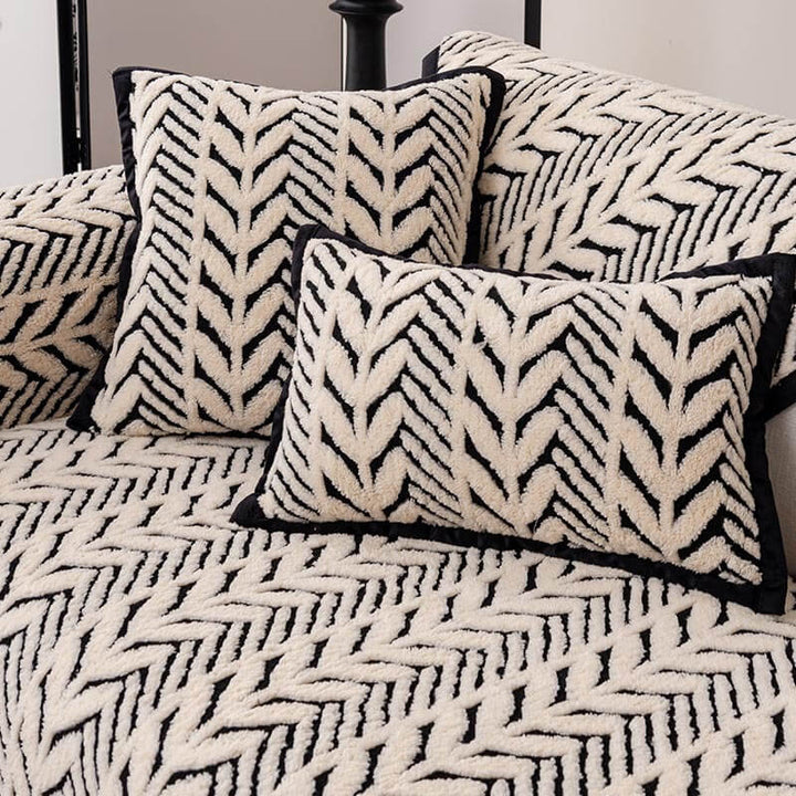 Stylish home decor addition: a plush sofa cover with an anti-slip wheat-ear design, great for families
