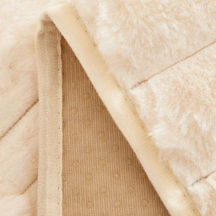 Soft plush striped sofa cover with anti-slip backing, ensuring a snug fit for your furniture