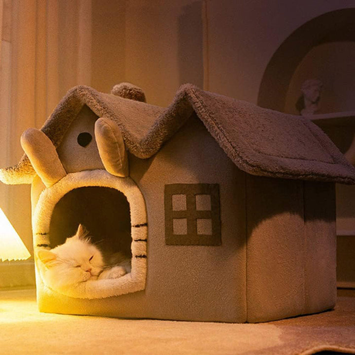 Warm and inviting plush tent pet bed with soft washable cushion for ultimate pet comfort