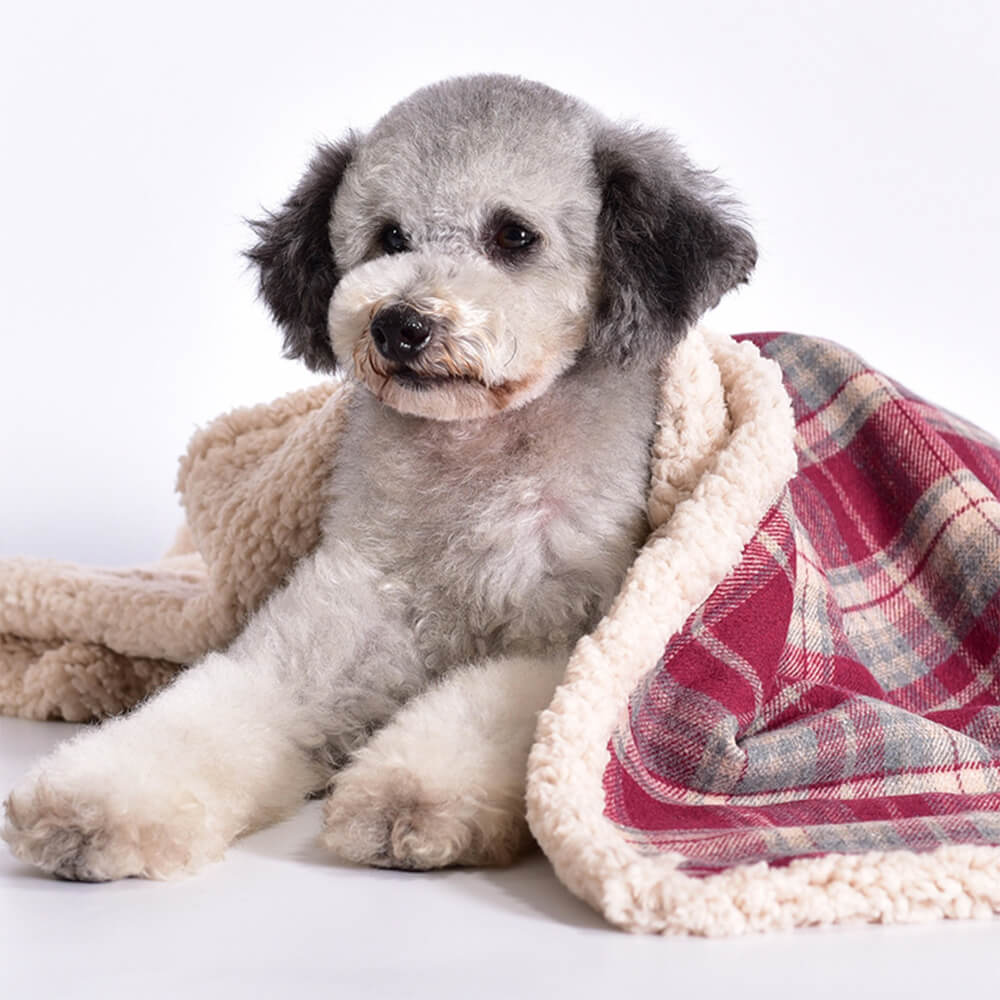 Cozy red & black plaid sherpa fleece dog blanket, soft pet bedding for warmth & comfort.