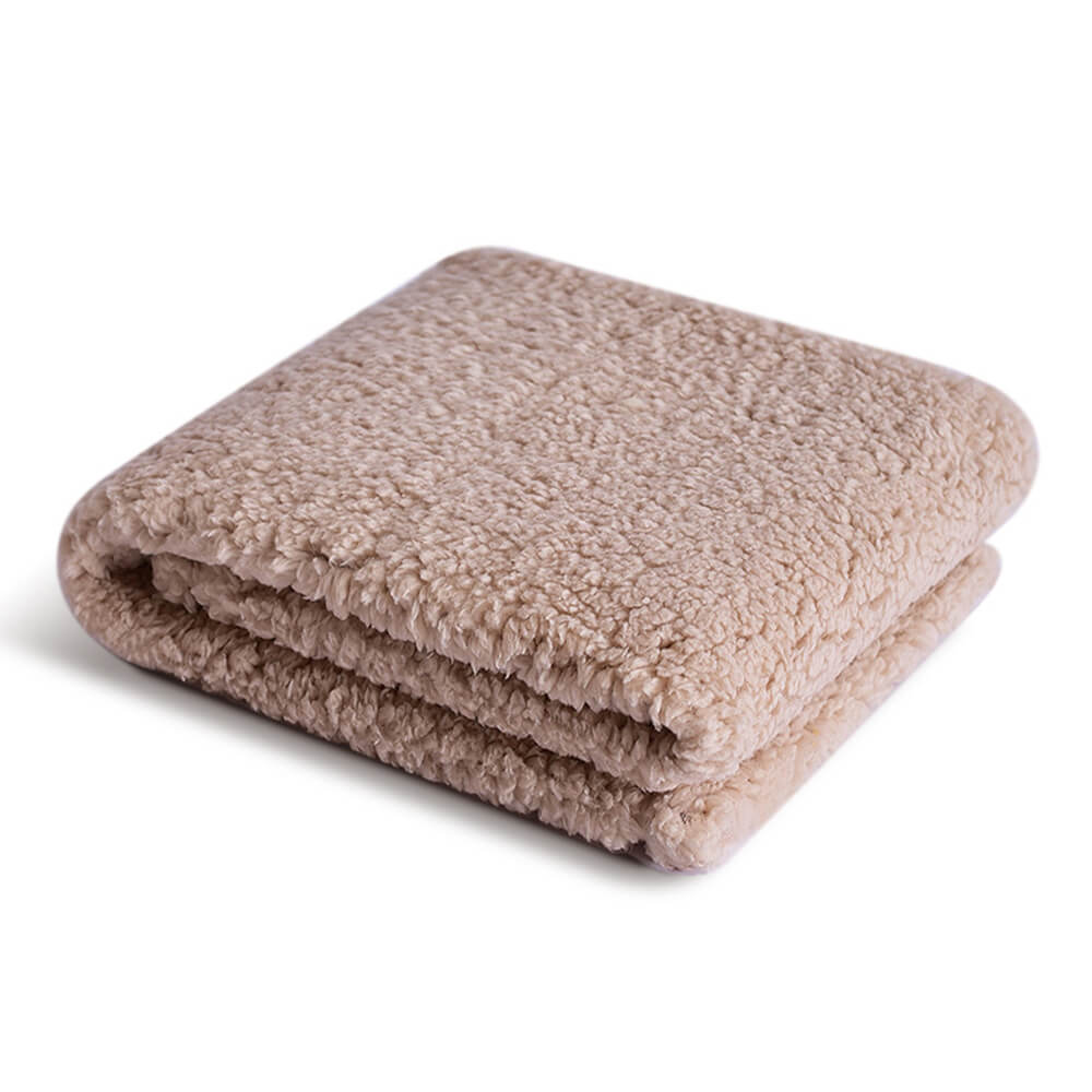 Lightweight yet warm sherpa fleece pet blanket, featuring a classic plaid pattern.