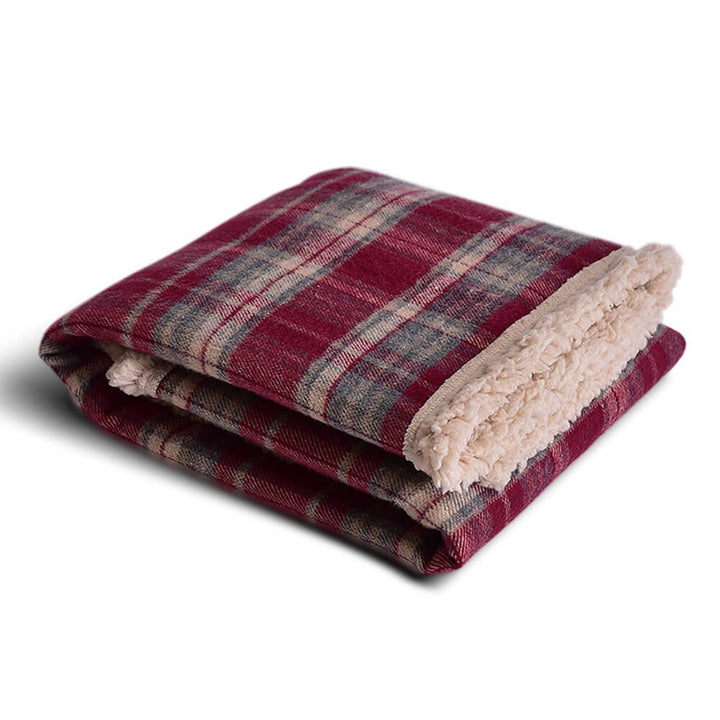 Generous size plaid sherpa fleece pet blanket, suitable for multiple furry friends.