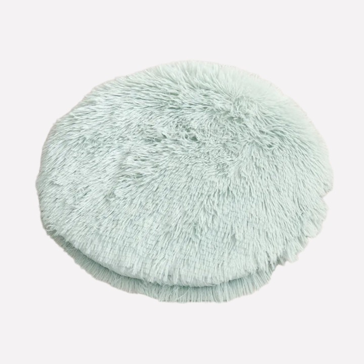 Grey round plush cat bed blanket, super soft for ultimate feline comfort.