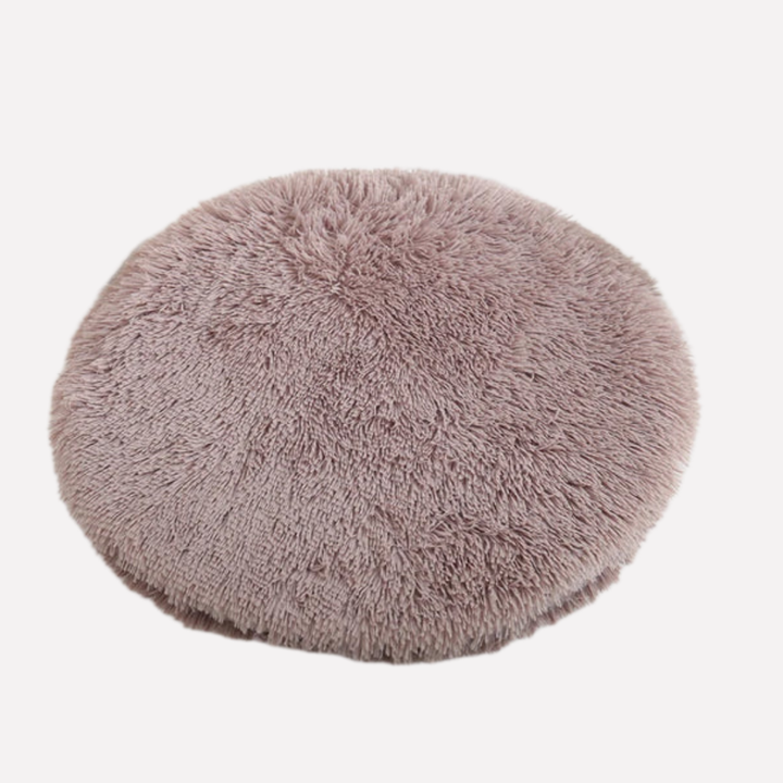 Cozy round pet blanket for dogs, plush material, providing warmth and security.
