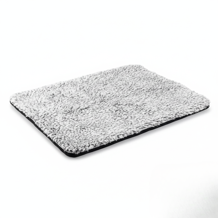 Soft cat or dog self-heating thermal pet bed, grey, providing warm comfort with non-slip and eco-friendly design.