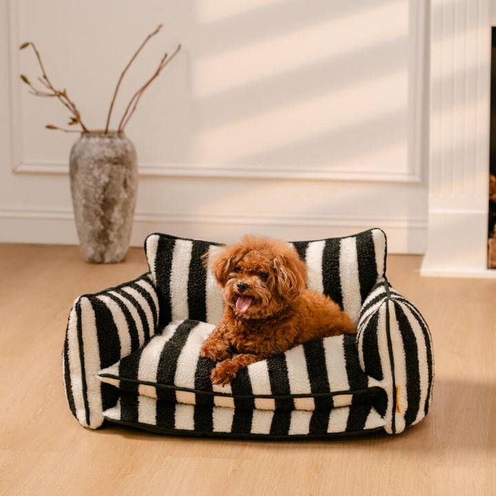 Cozy striped pet lounger, faux lambswool for softness, ideal dog or cat bed, durable construction