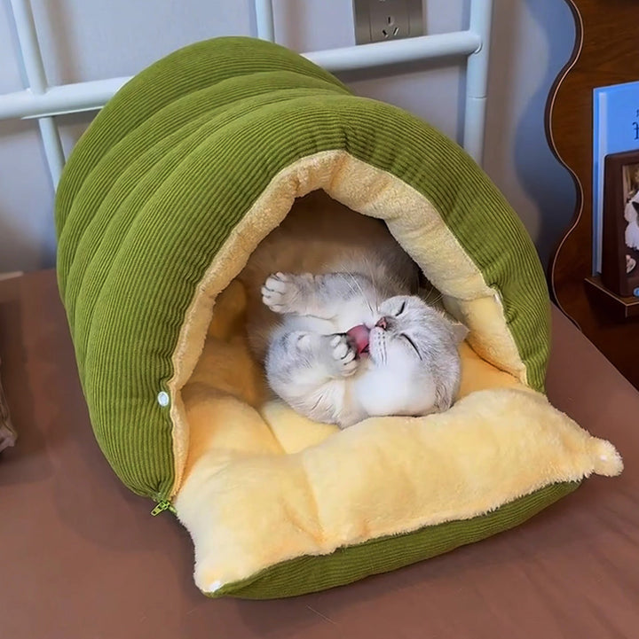 Plush cat bed with removable cover, ideal for a warm winter sleeping nest