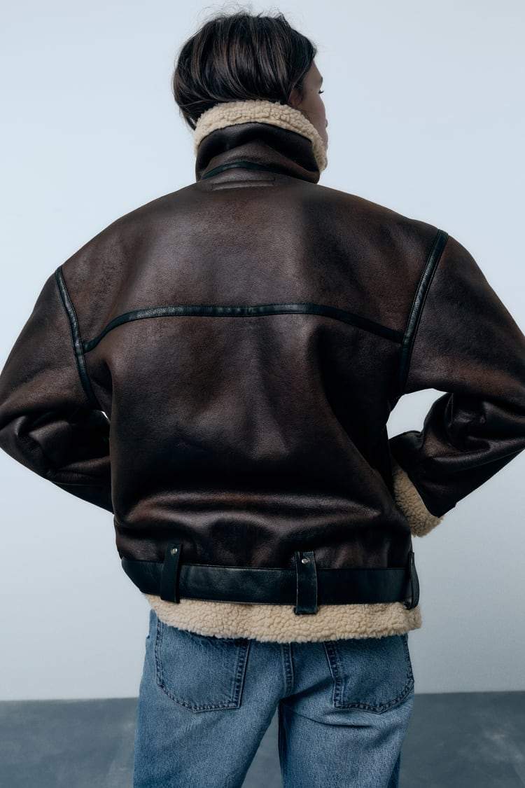 Women's cozy brown lapel jacket, ideal for fall fashion & winter style. A versatile, stylish outerwear piece for women.