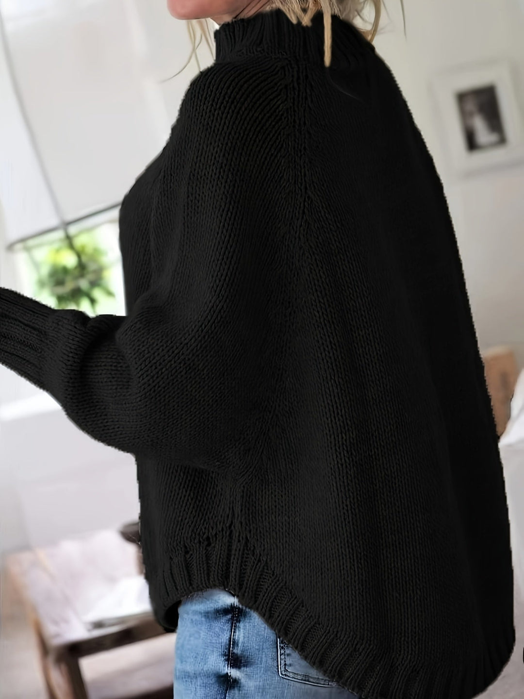 Women's fall fashion cable knit sweater, high-neck, with a flattering flared hem and oversized fit.