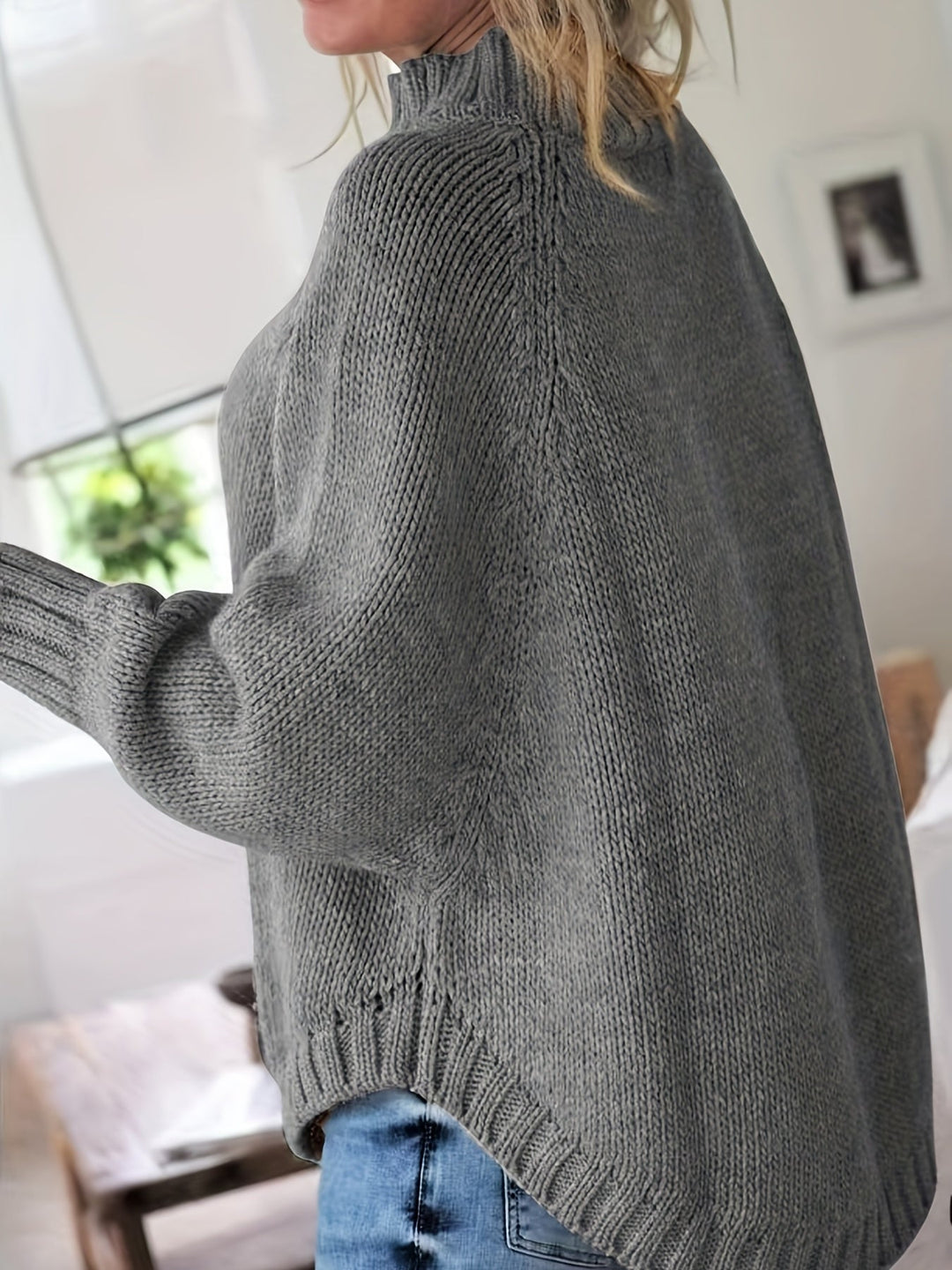 Women's warm high-neck cable knit top, ideal for a casual style, featuring a batwing sleeve.