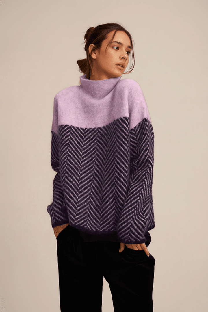 Cozy knitted women's high collar sweater. Relaxed fit pullover, warm winter wear for versatile style.