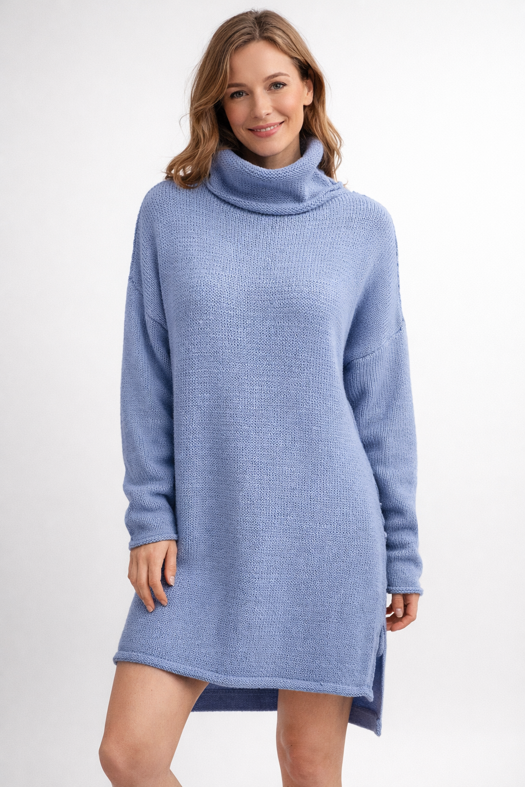 Cozy women's long knit turtleneck sweater in a relaxed fit for stylish winter fashion & warmth.