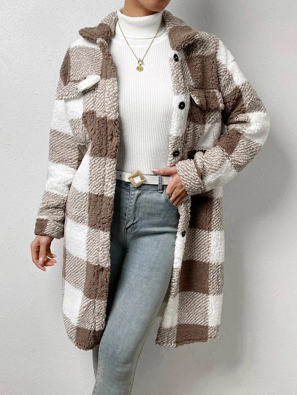 Trendy women's plaid longline jacket, warm and cozy button-up outerwear perfect for casual winter looks.