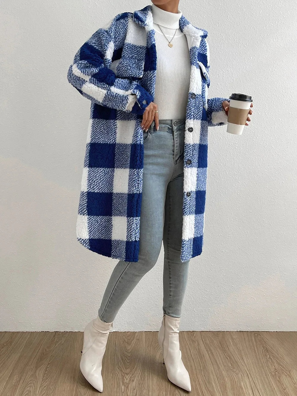 Fashionable women's plaid button-up jacket, a comfortable and casual longline outerwear piece.