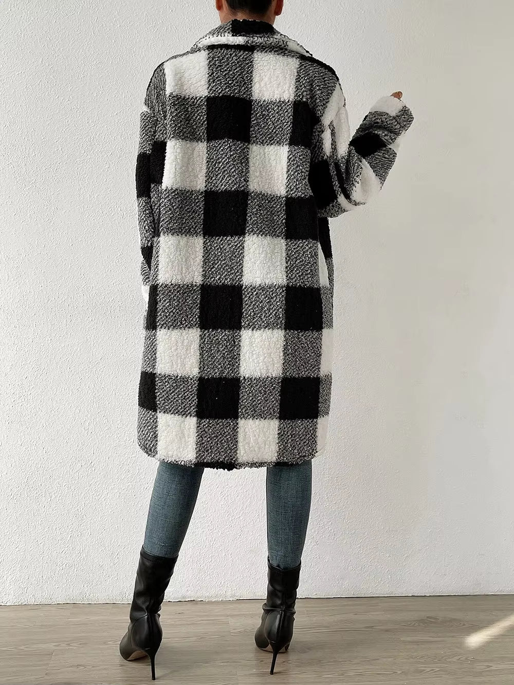 Stylish women's plaid longline jacket, a comfortable and casual button-up outerwear fashion piece.