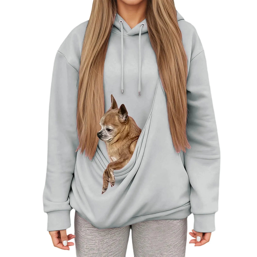 Functional women's hoodie, a comfortable pullover with an integrated pet carrying pouch.