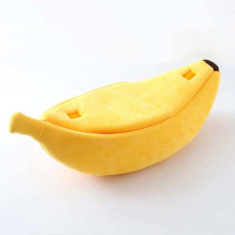 Cute banana-shaped cat bed, soft feline accessory for pet comfort.