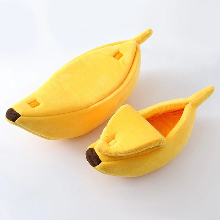 Playful yellow banana cat bed, a cozy and cute pet accessory for kitties.