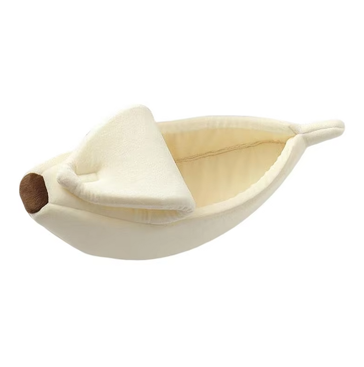 Winter pet bed, uniquely shaped like a banana for a cozy animal nest.
