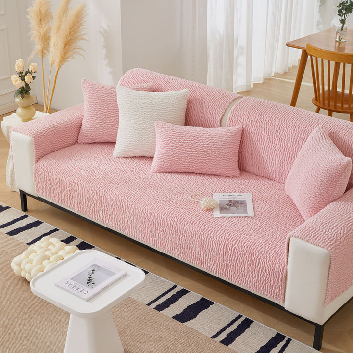Packaging of a cream berber fleece sofa cover, highlighting anti-scratch and washable