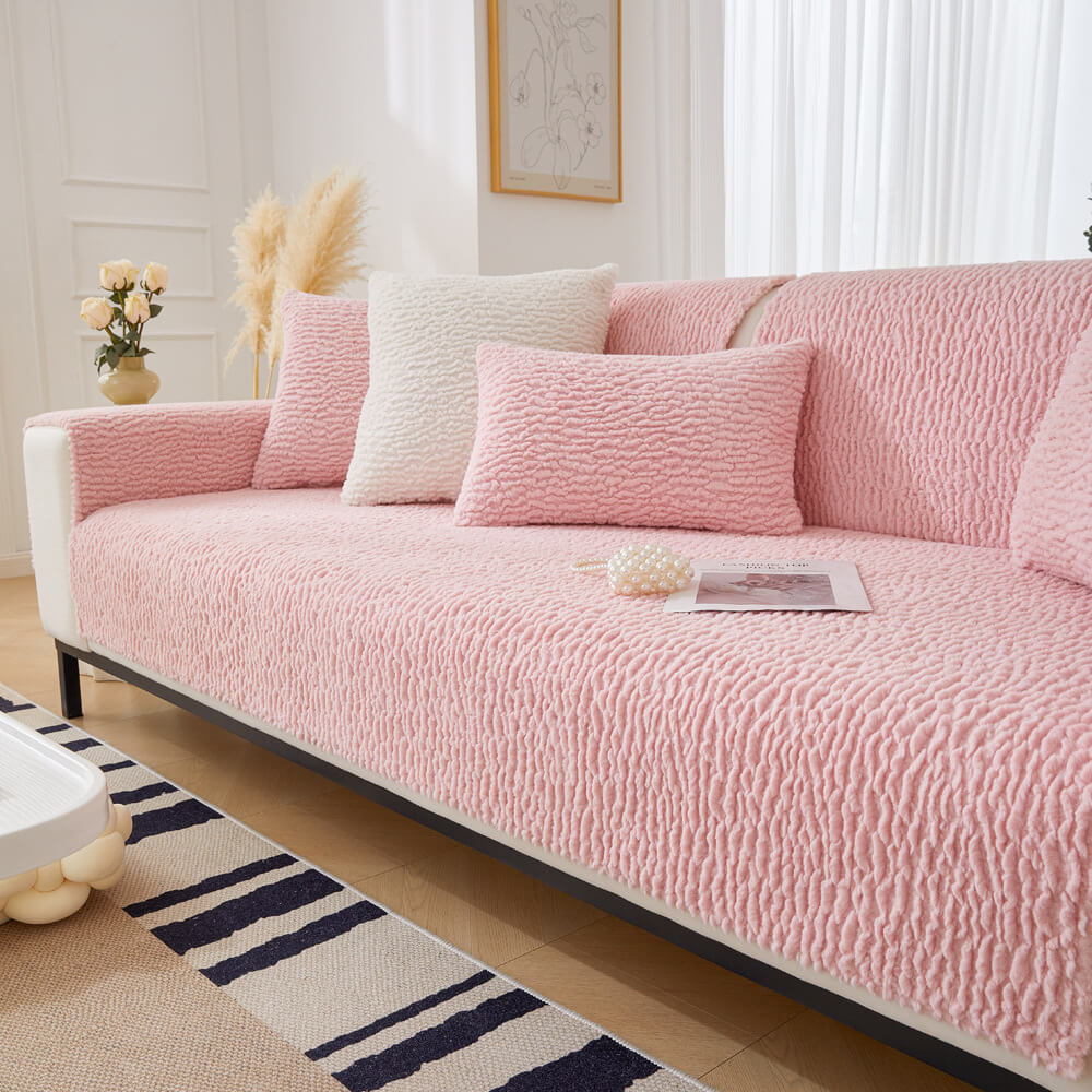 Easy installation of a non-slip cream berber fleece sofa protector for pet owners