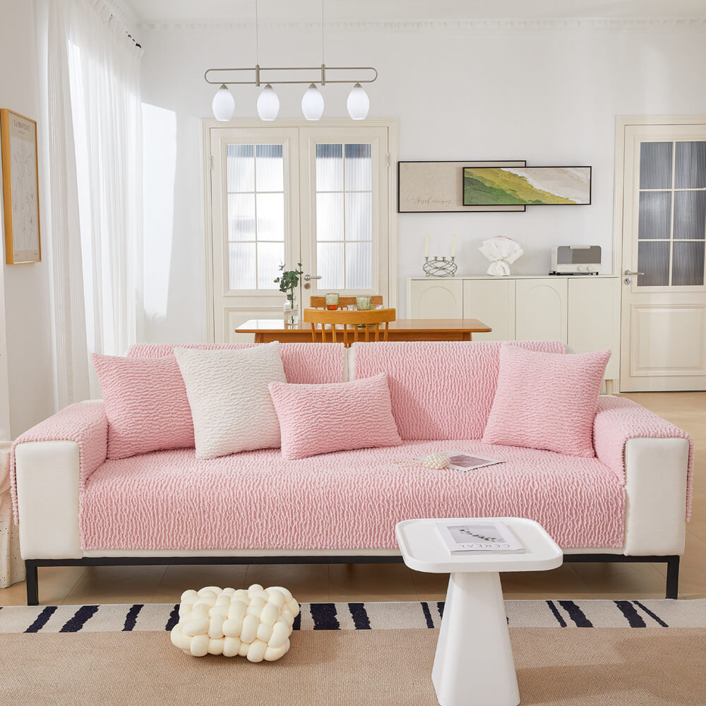Cream berber fleece couch cover protecting furniture from spills, pet friendly feature