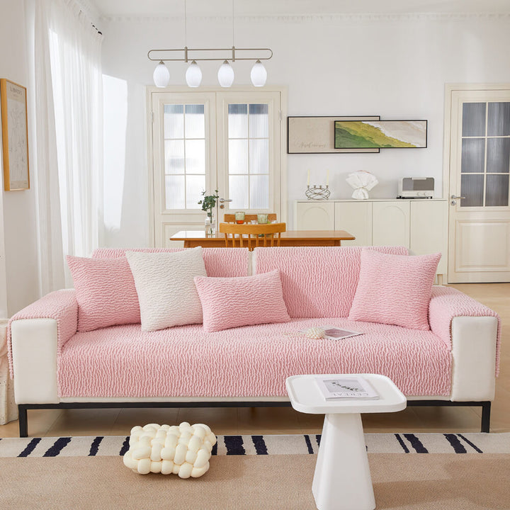 Cream berber fleece couch cover protecting furniture from spills, pet friendly feature