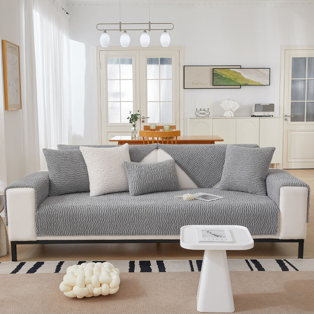 Before and after applying a cream berber fleece sofa cover, improved home decor