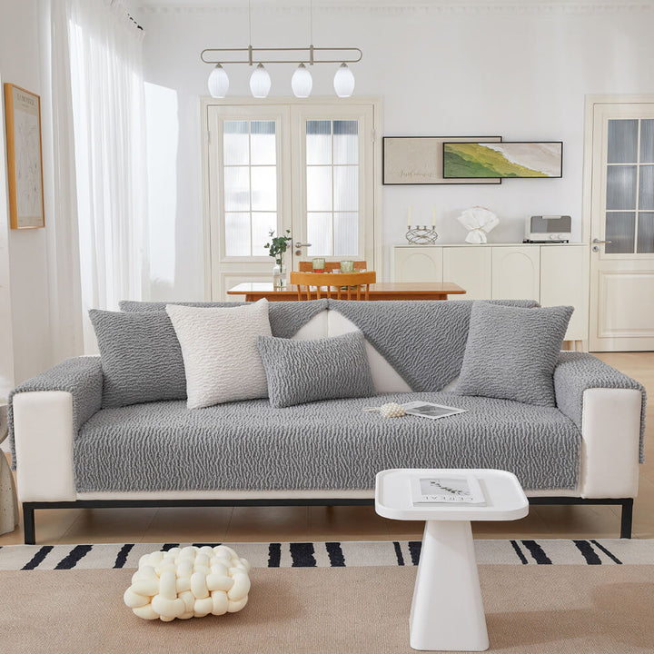 Before and after applying a cream berber fleece sofa cover, improved home decor