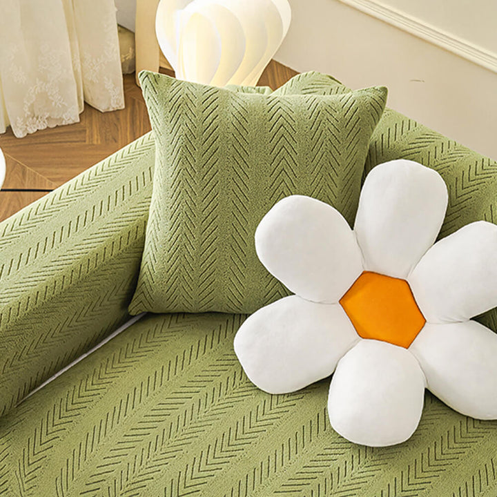 Universal cream herringbone sofa slipcover, machine washable stretch couch cover for easy pet-friendly care.
