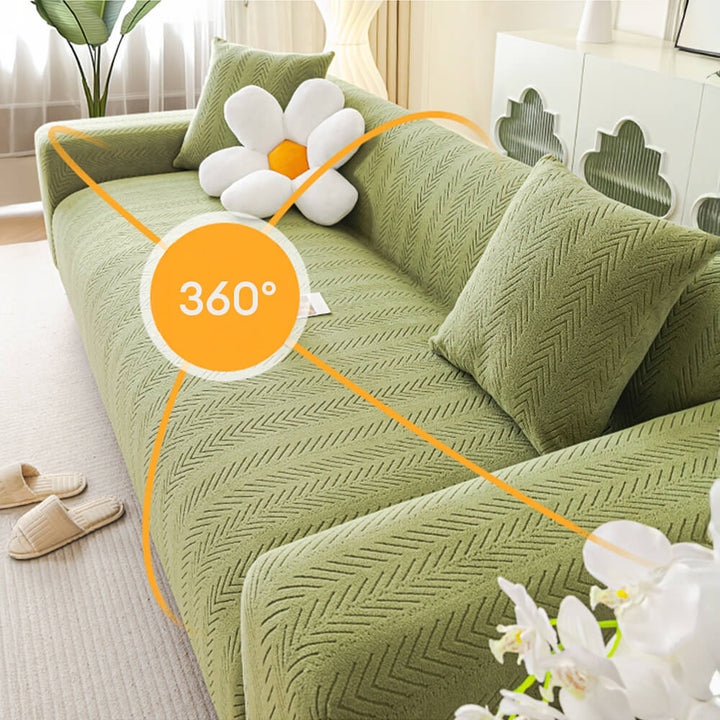 Textured cream herringbone stretch sofa cover, elastic and pet-friendly furniture protector for living room.