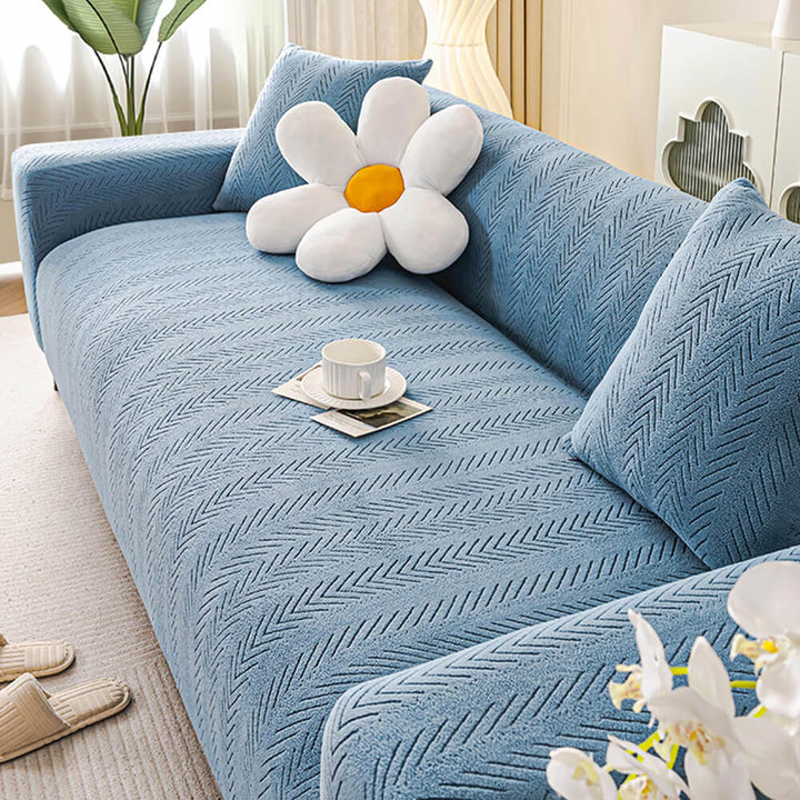 Modern cream herringbone sofa slipcover, elastic stretch fabric, durable and pet-friendly furniture protection.
