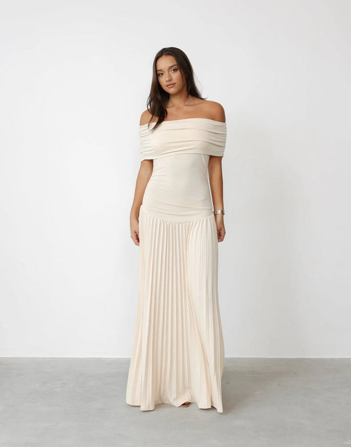 Cream off-shoulder pleated maxi wedding guest dress for women.