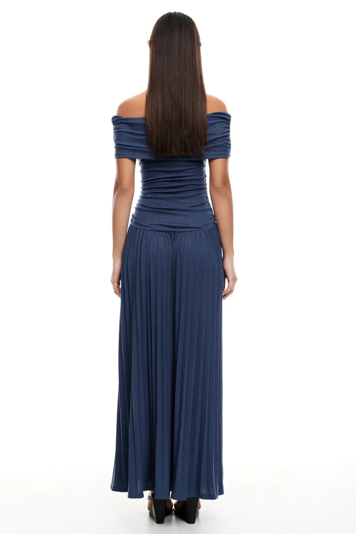 Sky blue off-shoulder pleated maxi wedding guest dress, drop waist detail.