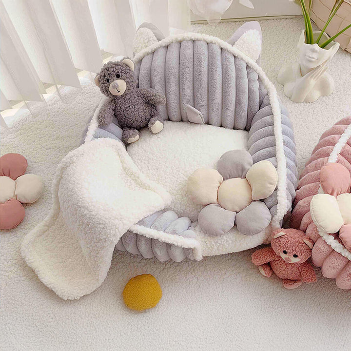 Durable cream pink washable dog bed, fluffy pet sofa offering cozy support for pets