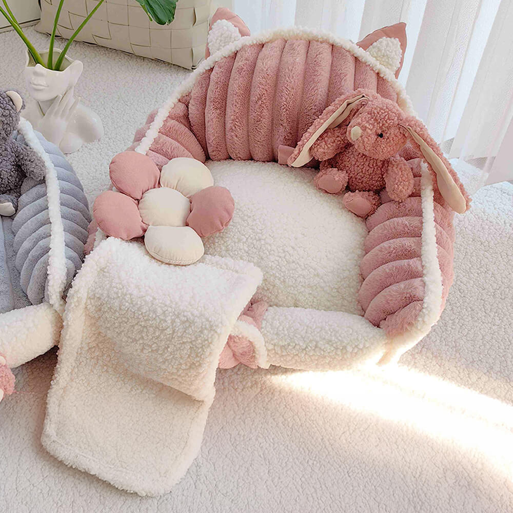 Stylish cream pink pet sofa bed, a washable fluffy dog accessory for cozy pet naps