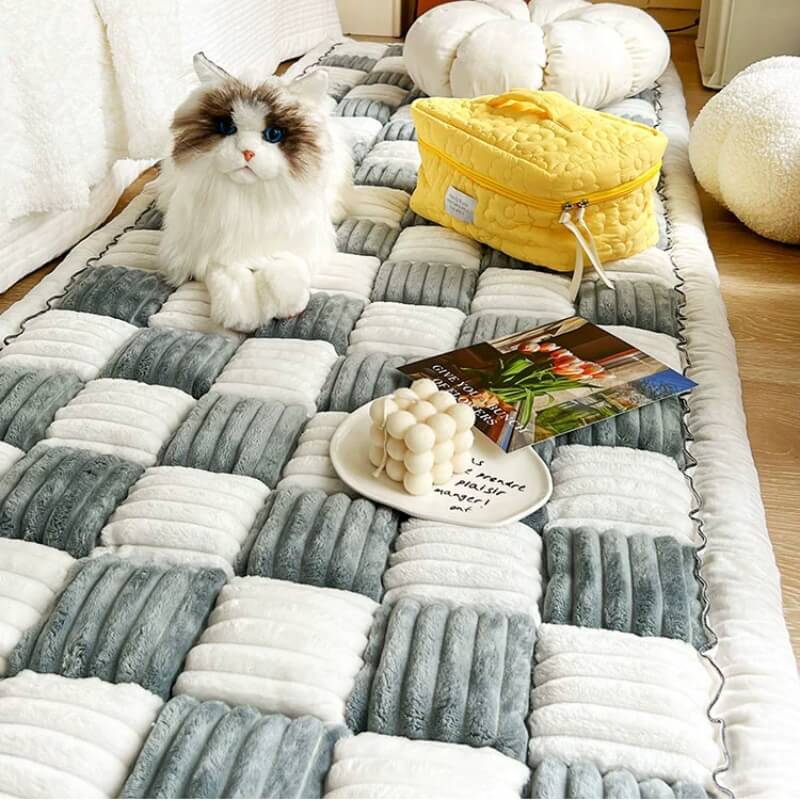 Cream plaid pet couch protector, fuzzy chenille, non-slip design, a great dog bed alternative
