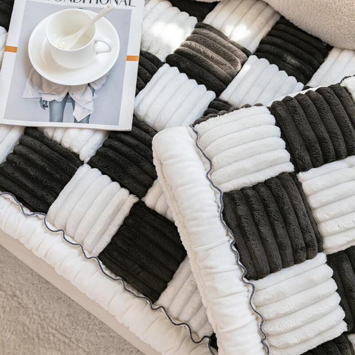 Plaid pet couch cover in cream, fuzzy texture, serves as a comfy dog bed or cat bed