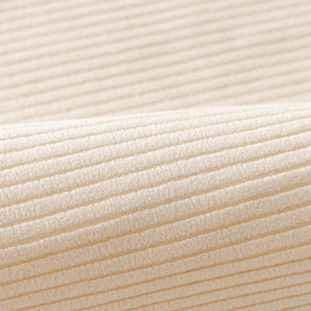 Detail of the vertical stripe pattern on a cream fleece couch cover, suitable for pet-proof interiors.