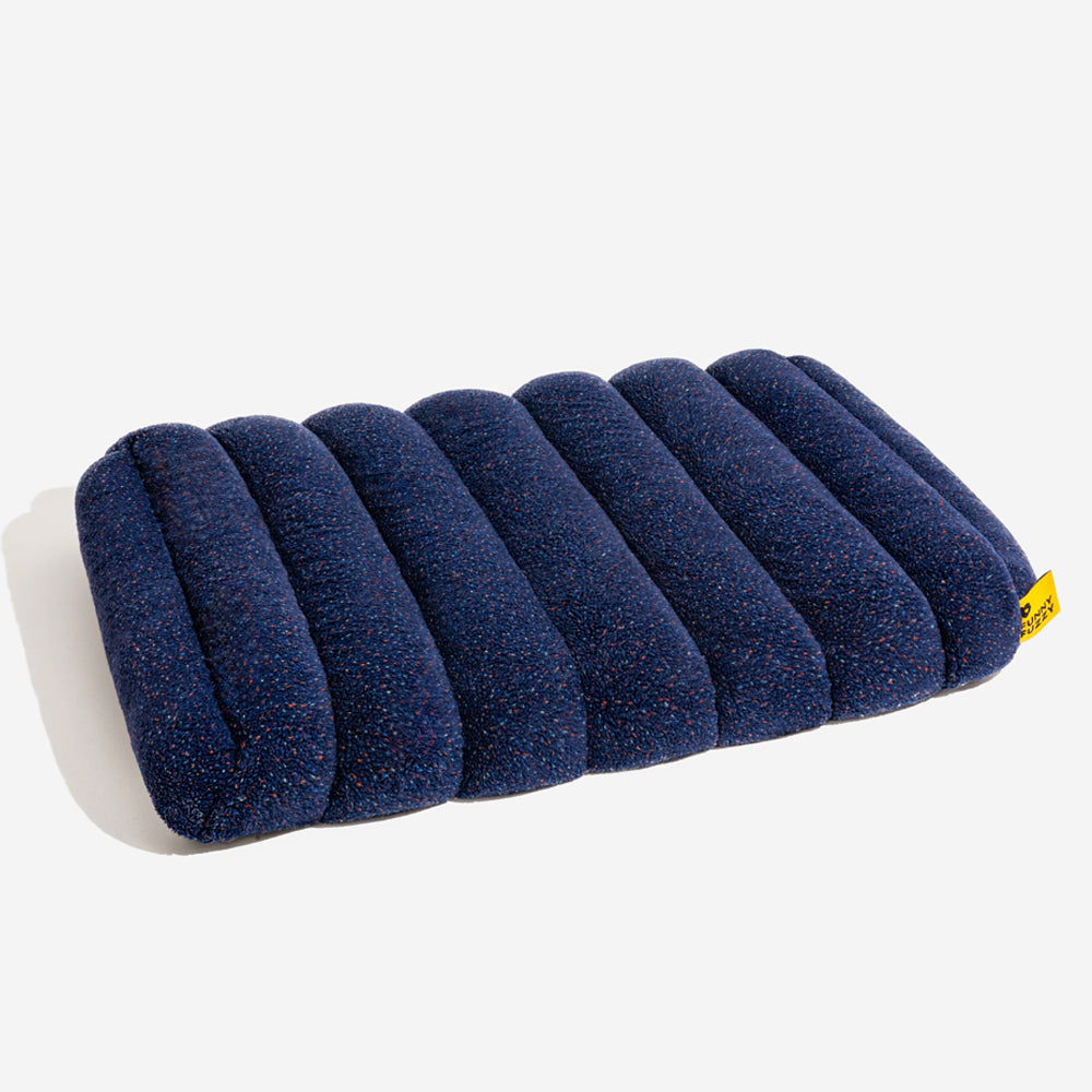Creamy pet bed, memory foam, orthopedic, soft and washable.