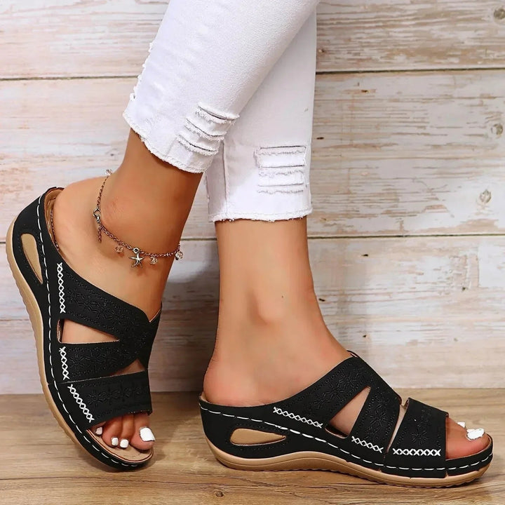 Elegant women's cross-strap orthopedic sandals with adjustable fit, designed for superior comfort & foot health.