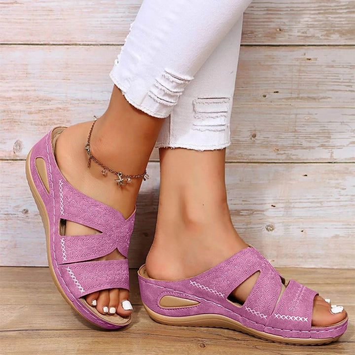Casual women's orthopedic sandals with adjustable cross-straps, providing excellent foot support & comfort.