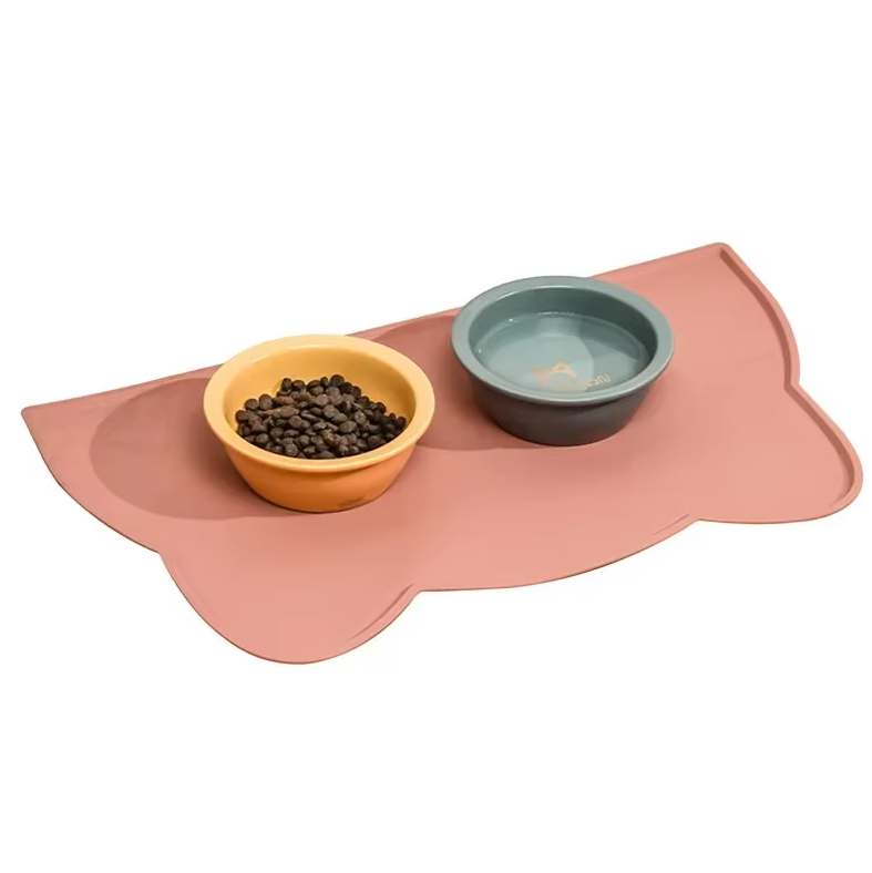 Pet feeder cat accessory: non-slip silicone mat, cleverly cat-shaped to secure pet bowls.