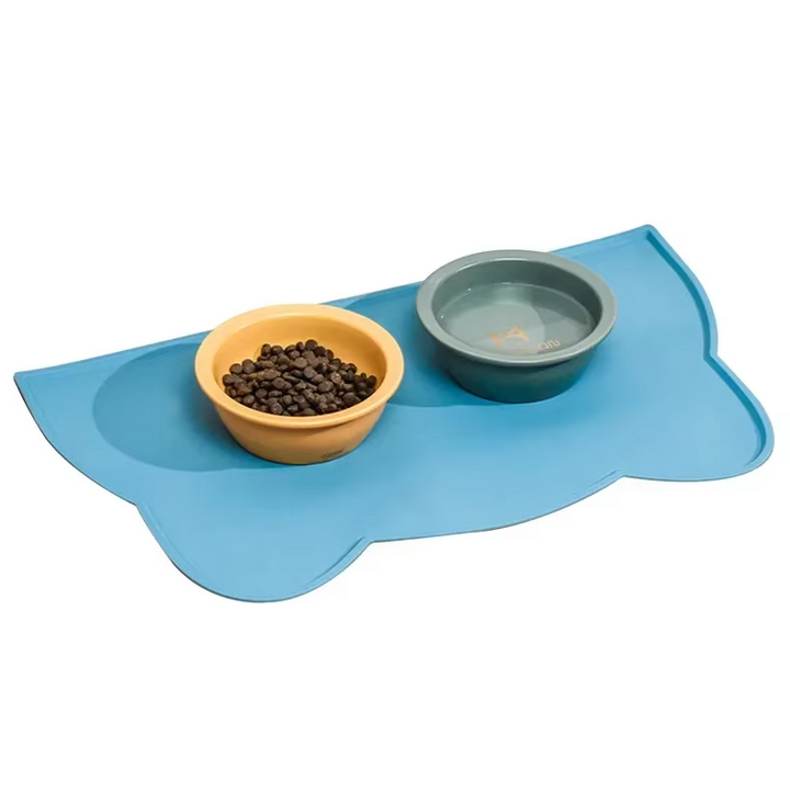 High-quality silicone cat-shaped pet feeding mat, non-slip design for stable and clean cat bowls.